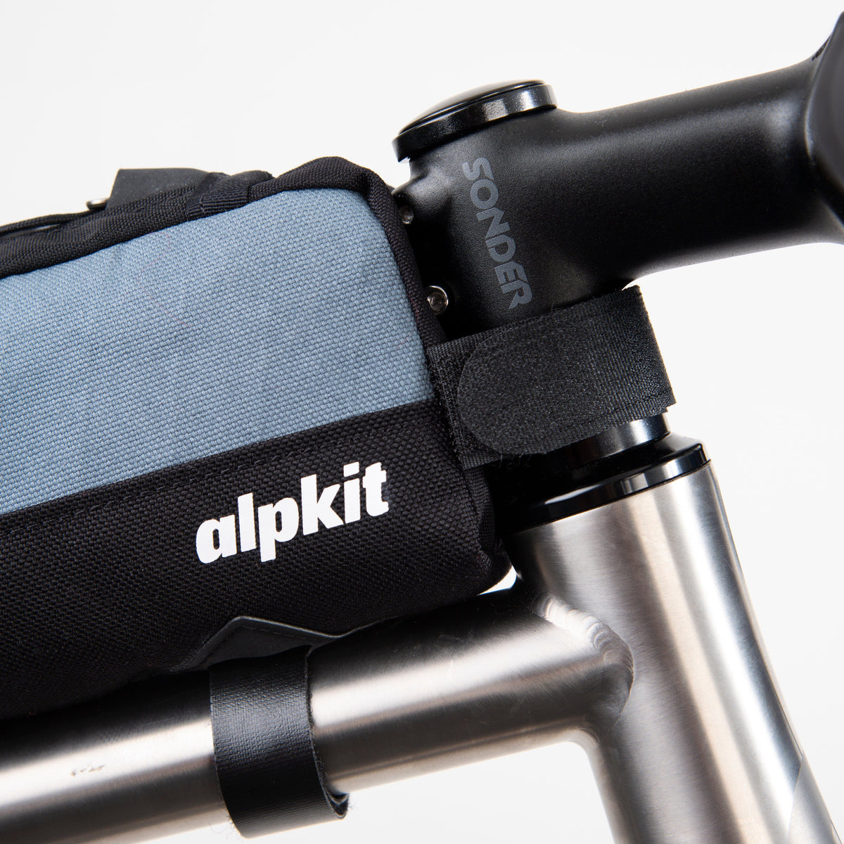 alpkit fuel pod long top tube bag for bikepacking in storm grey logo