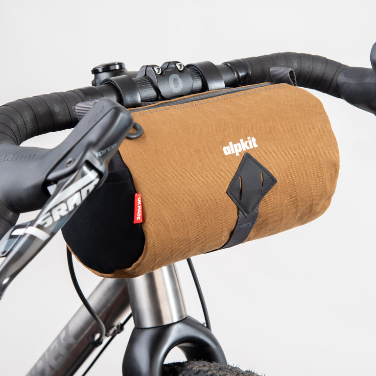 alpkit toploader zipped handlebar bag in mountain brown logo