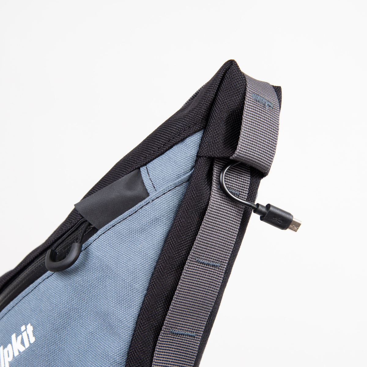 alpkit wombat rear framebag in storm grey cable port