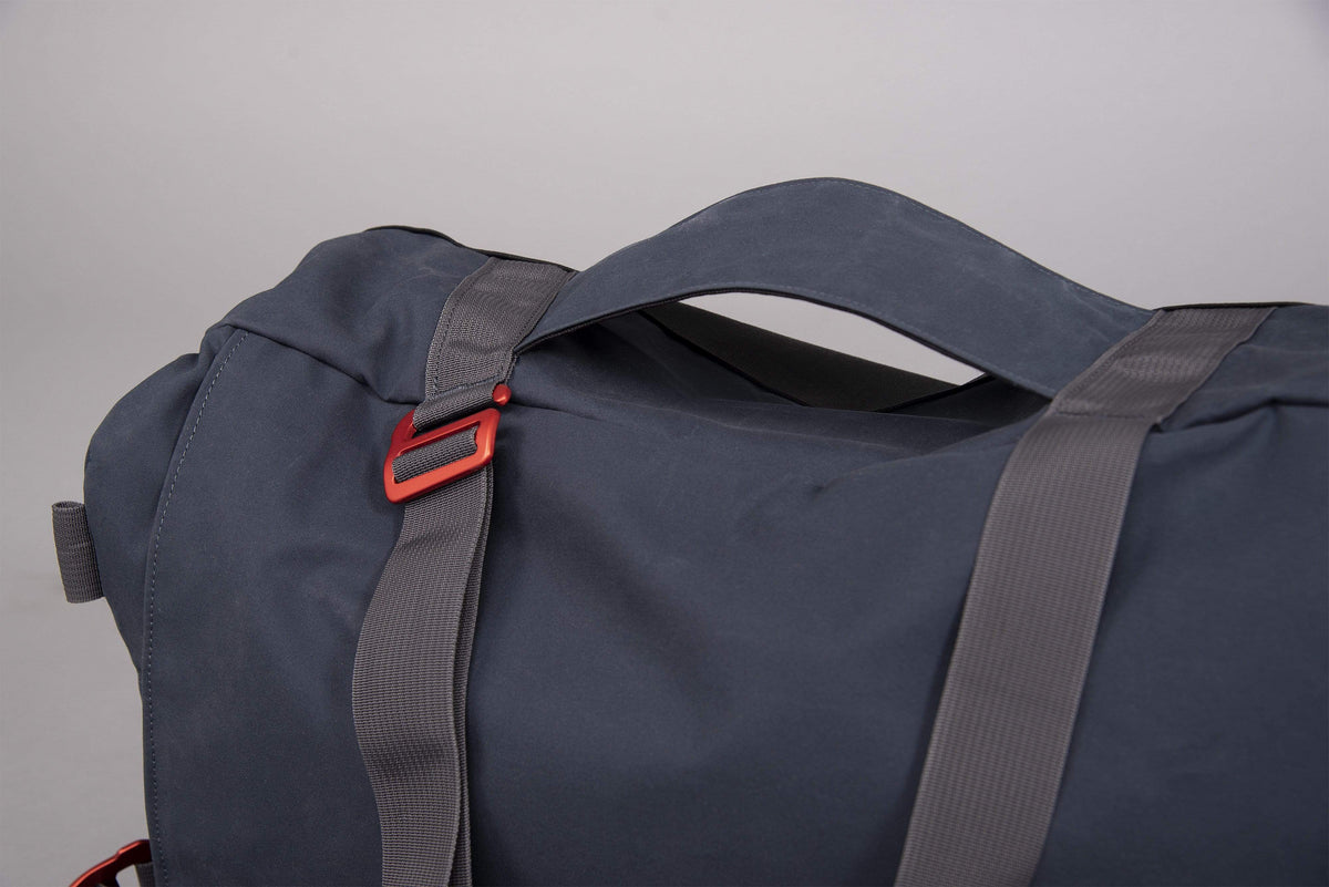 idaho 30 waxed cotton duffle bag in denim suitcase loop - closed