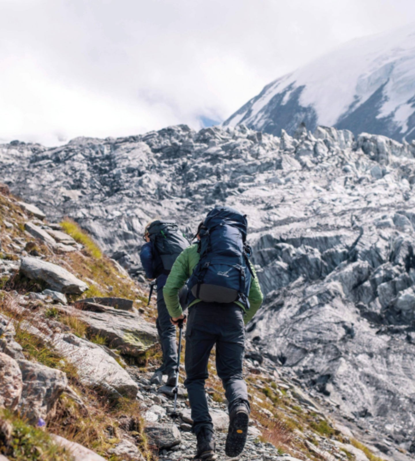 Backpacking in the Alps with a loaded rucksack