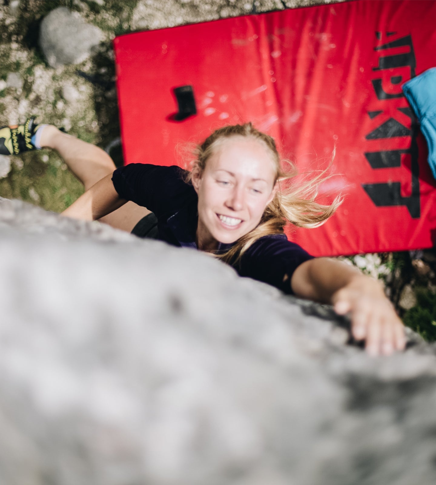 Climbing above a bouldering mat