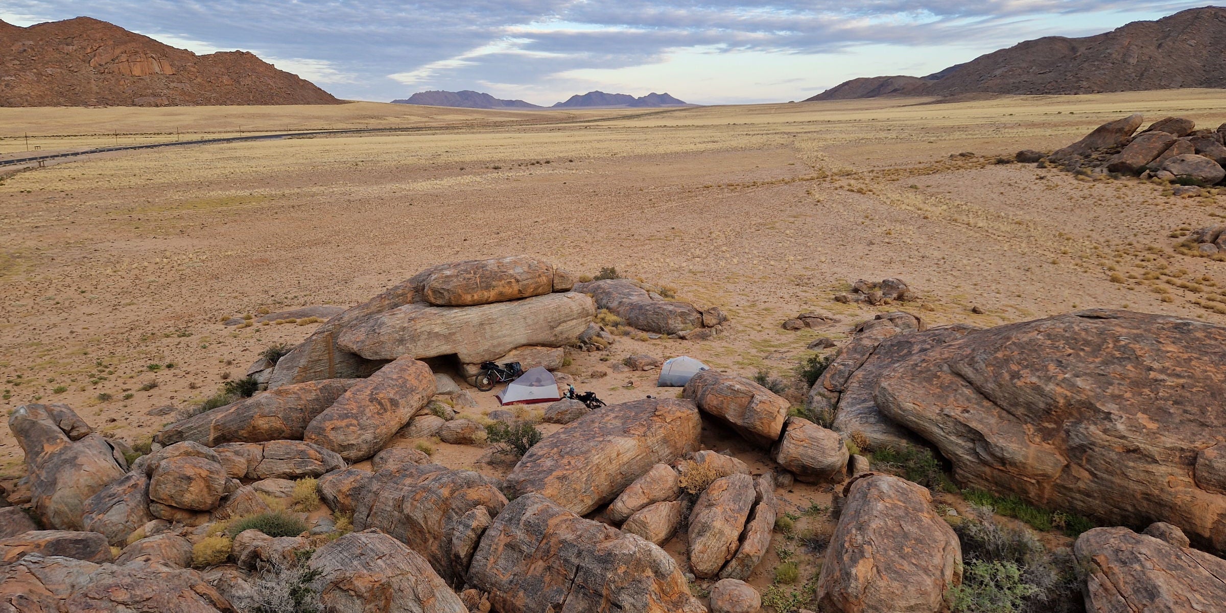 Remote wild campsite cycle touring in Africa