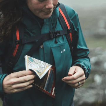 Reproofing a waterproof coat to increase its performance and extend its life