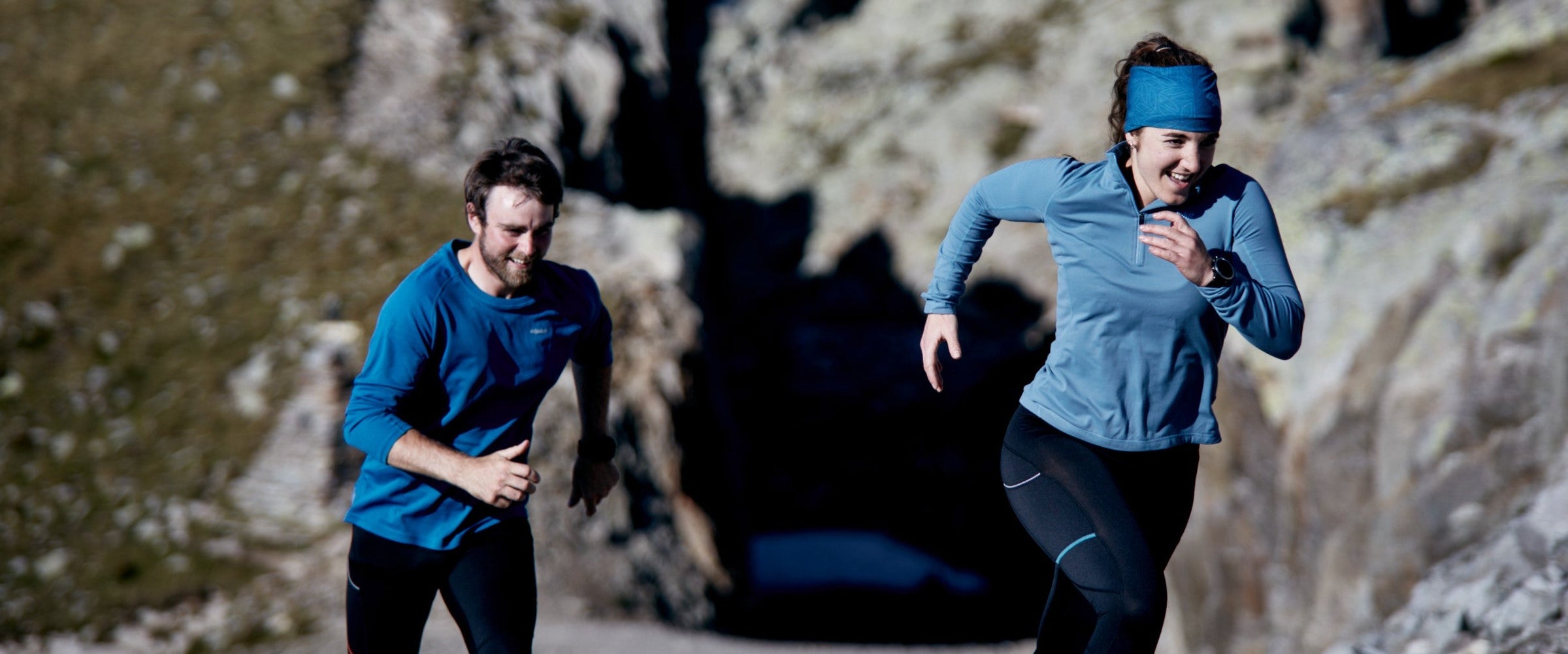 Runners wearing base layers for trail running