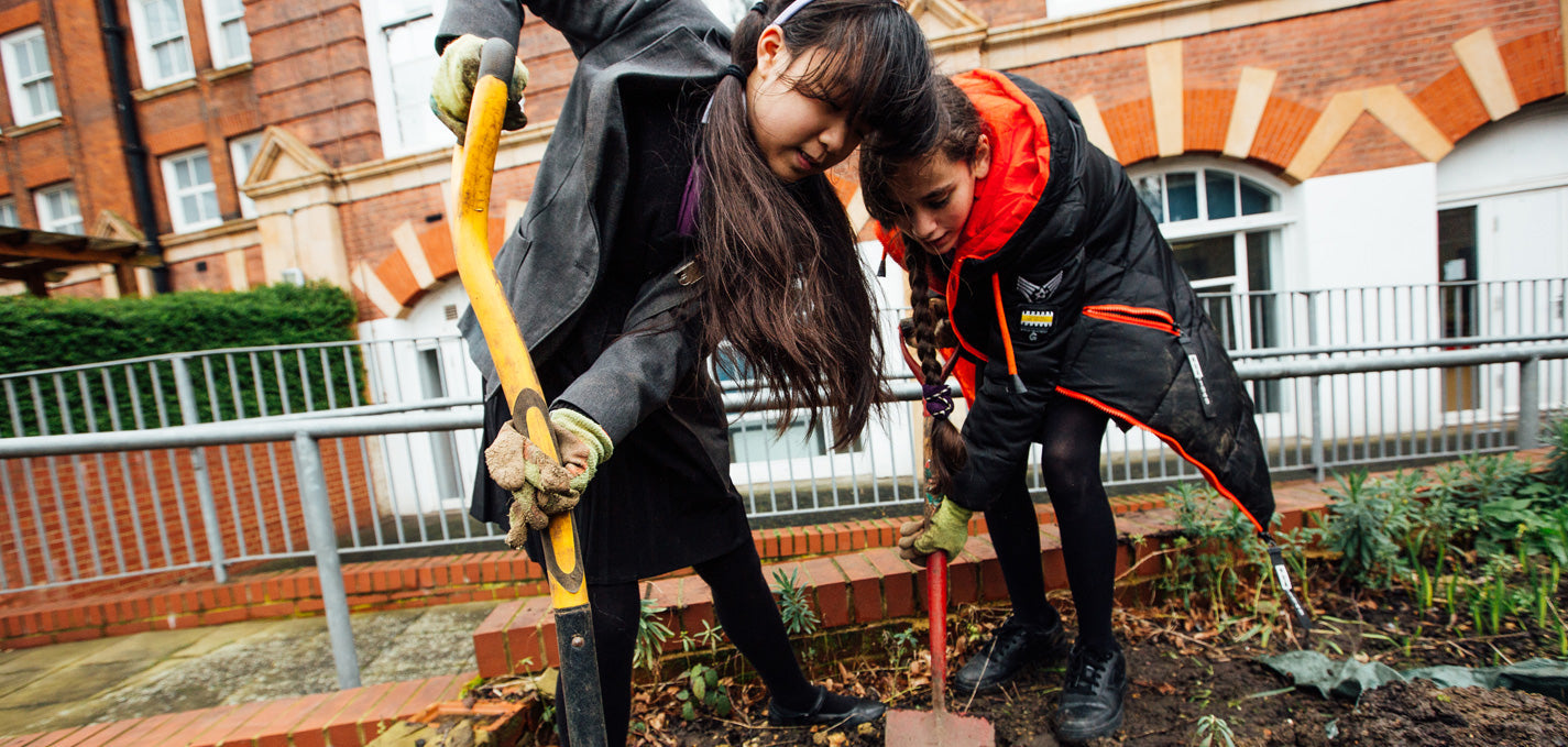 Pupils taking part in an outdoor nature-connection session at school