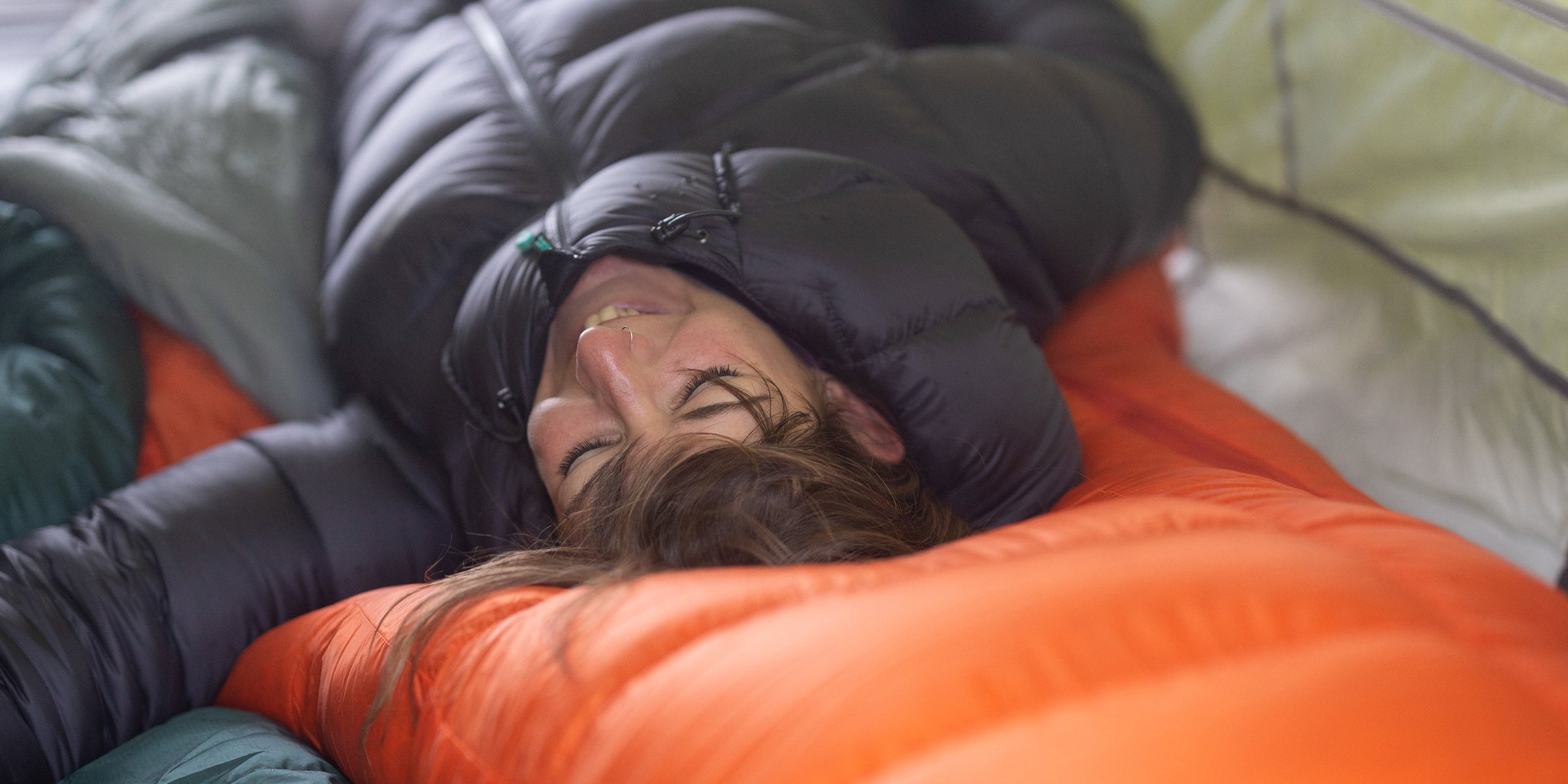 Increase performance of down sleeping bags by washing regularly