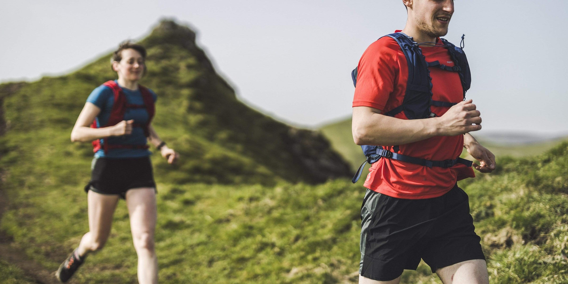 Trail running in tech tees and trail running rucksacks
