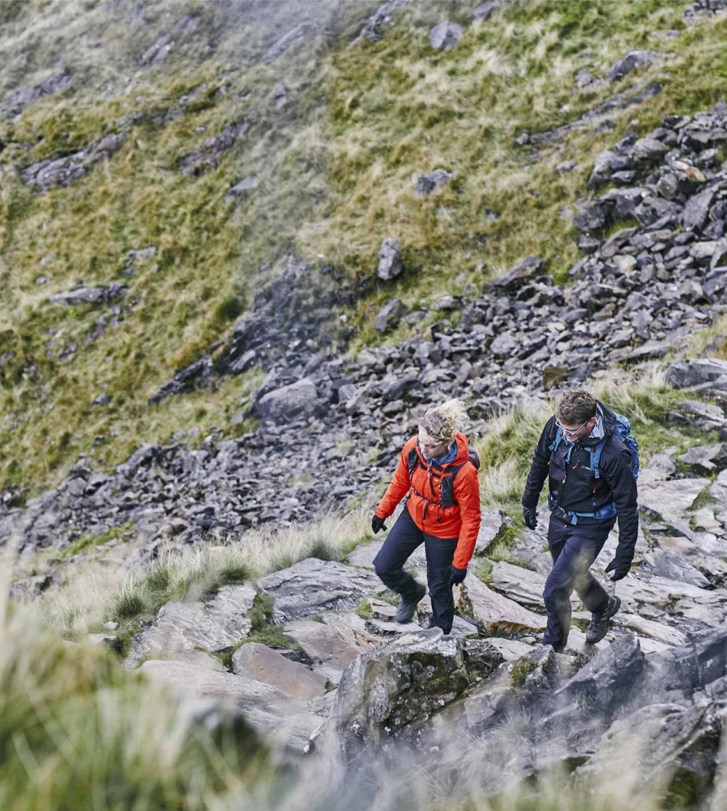 Hiking in rain wearing Nautilus waterproof trousers