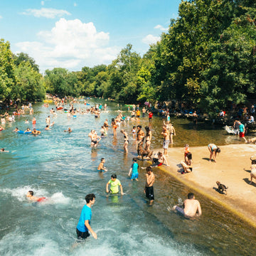 Outdoors swimming with floats in the river Thames