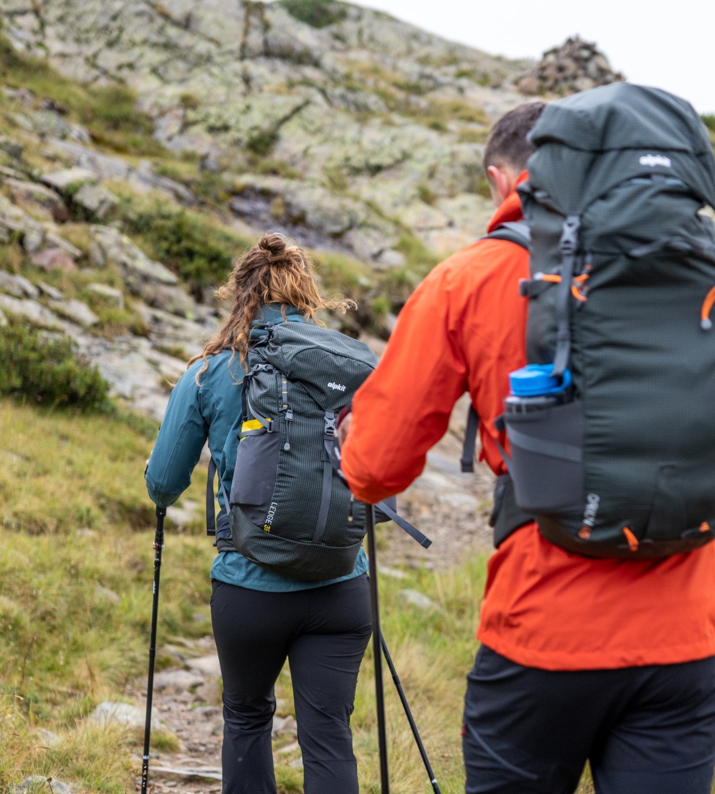 Hillwalkers with loaded rucksacks