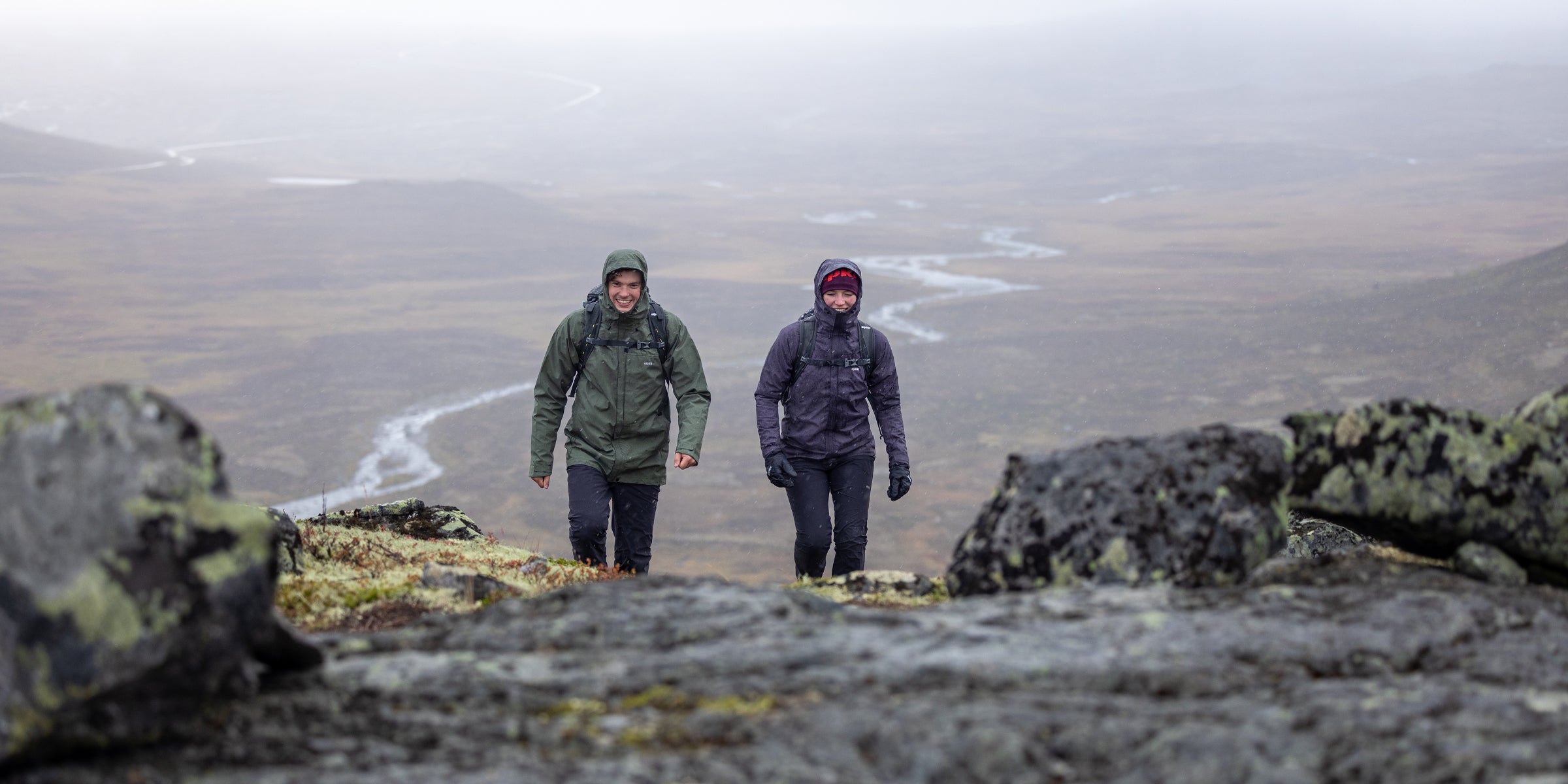 Hillwalkers hiking in the rain