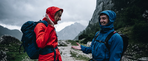 Waterproof jackets keeping 2 hikers dry in the rain