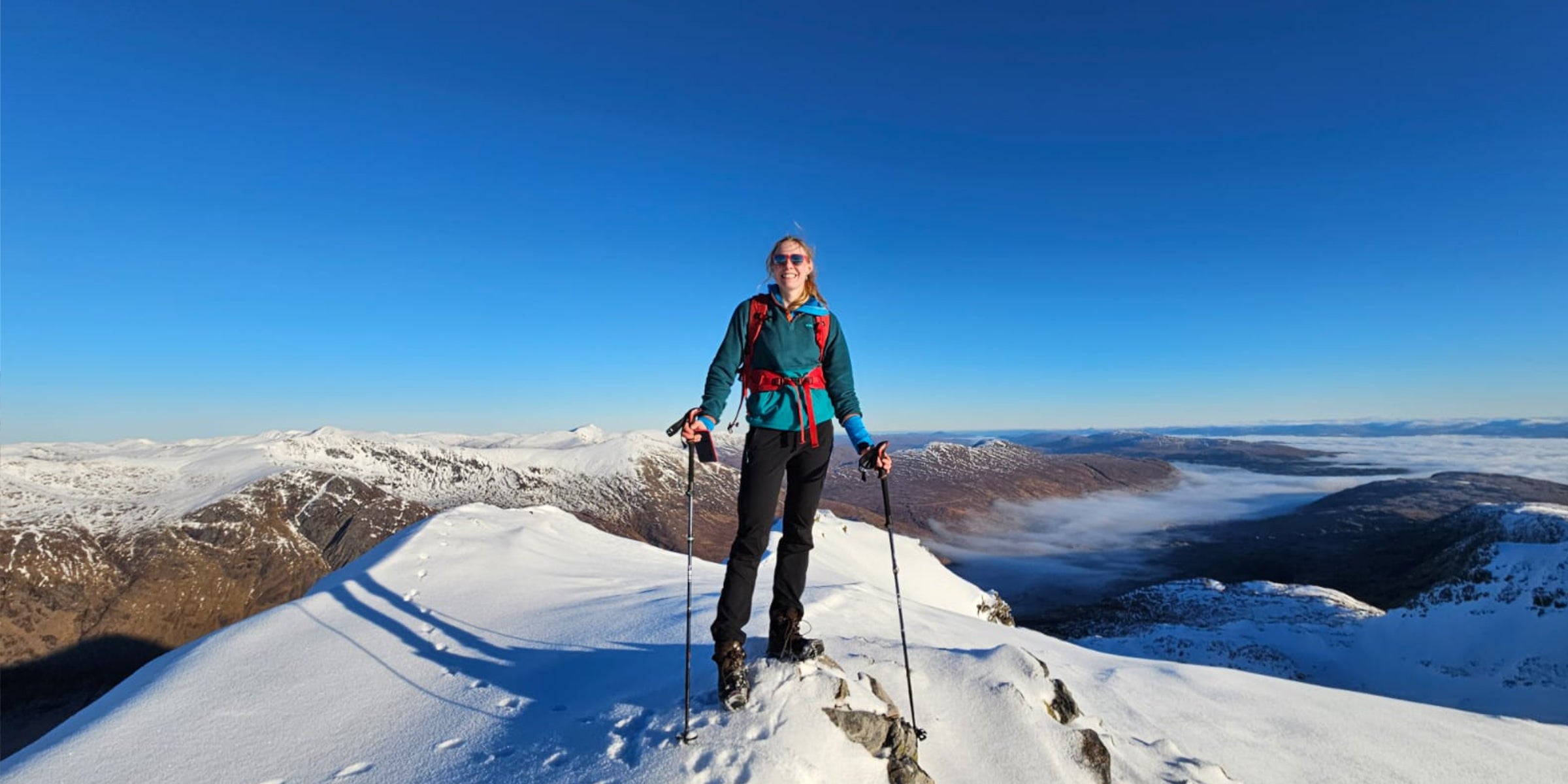 Anna Wells summiting during her winter munro challenge
