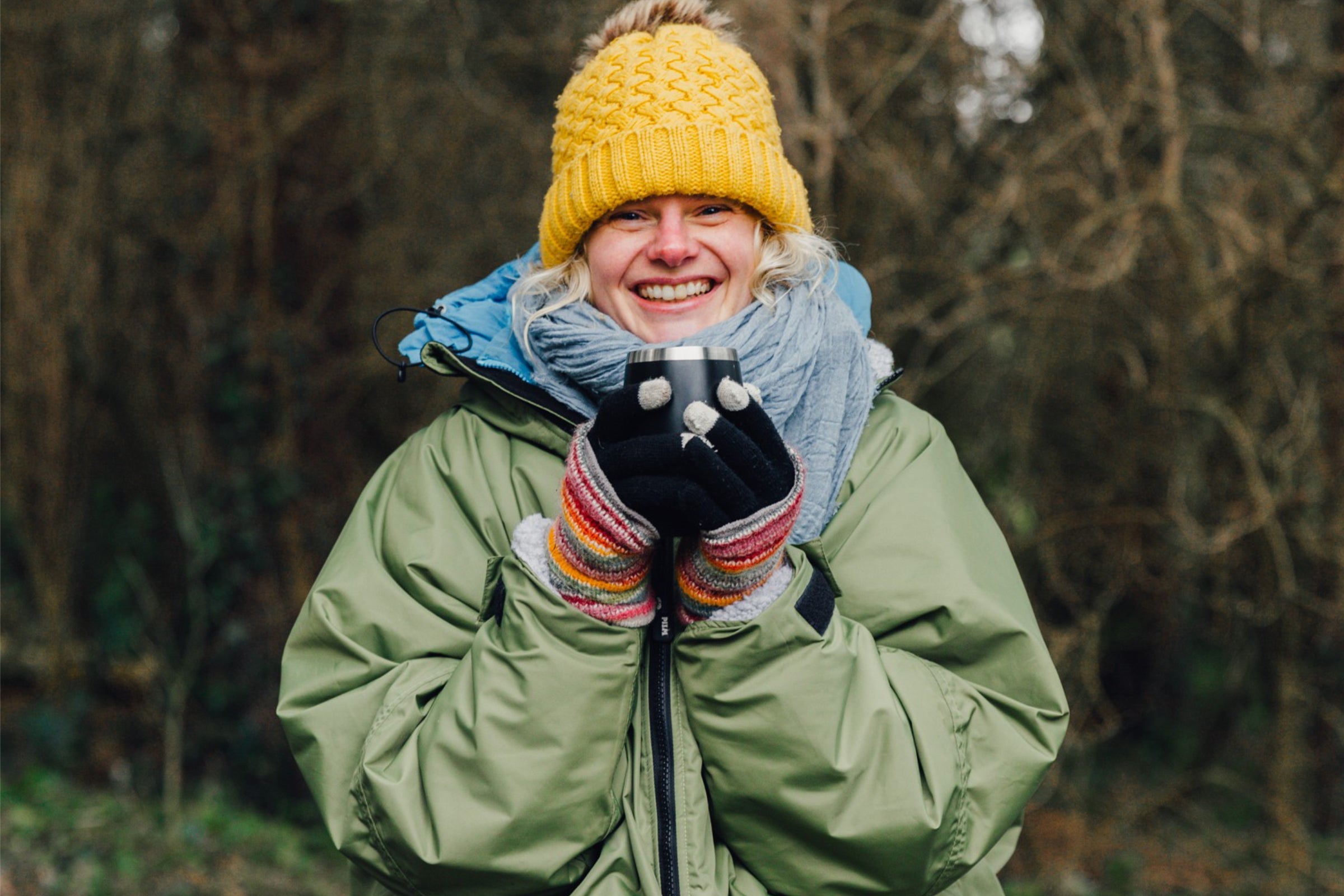 Winter outdoor swimmer dressed in dry robe
