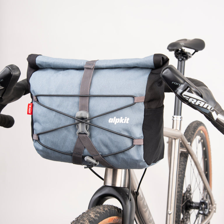 alpkit gravel bag handlebar bag for drop bars in storm grey front