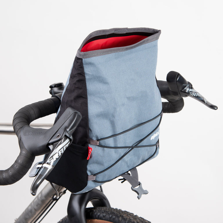 alpkit gravel bag handlebar bag for drop bars in storm grey open