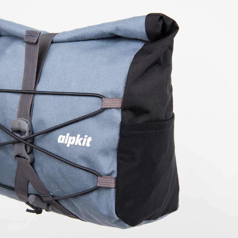 alpkit gravel bag handlebar bag for drop bars in storm grey mesh pockets 