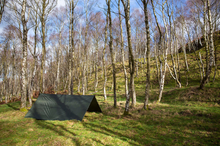 Alpkit 4 square tarp pitched - action - closed