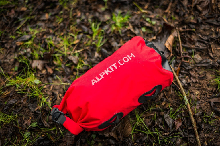 Red Alpkit dry bag