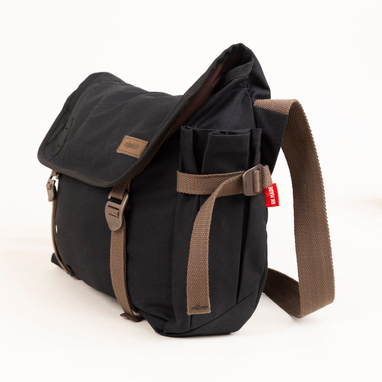 alpkit alleycat messenger bag in black bottle pocket