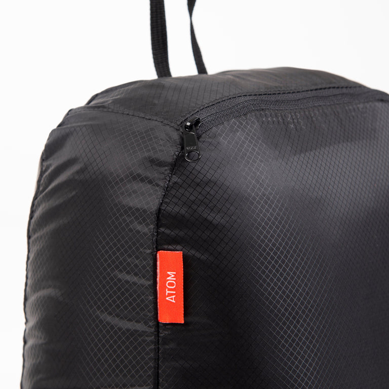 alpkit atom packable back pack in black logo