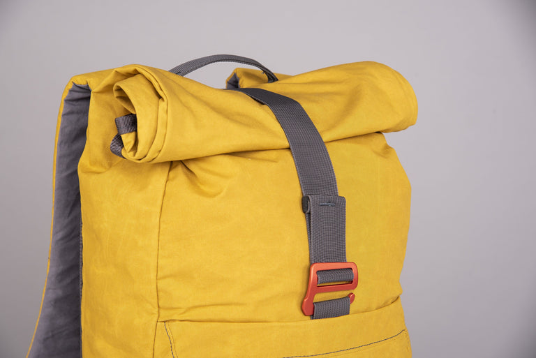 Alpkit tyrol wax cotton pack in mustard roll top - closed