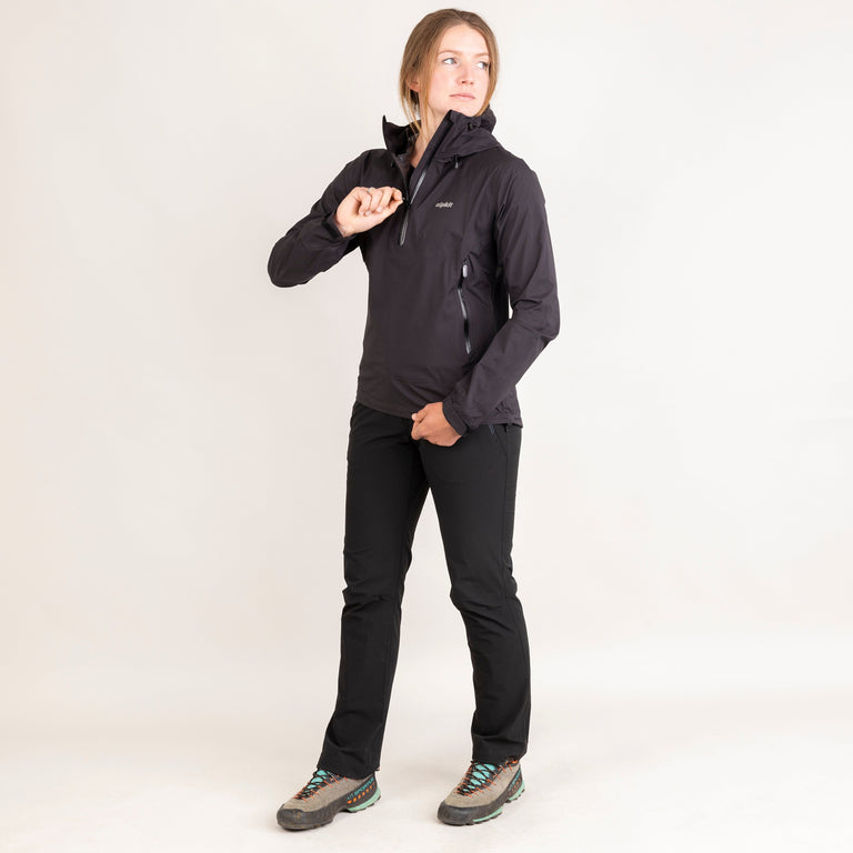 Alpkit women's Pulsar waterproof smock jacket in black outfit